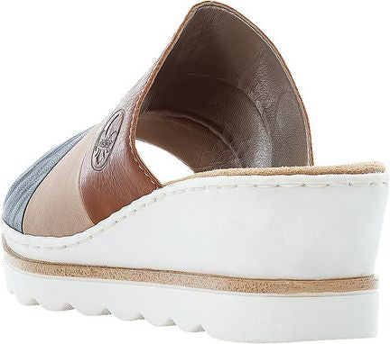 Slide sandal: open toe, multi-tone neutral leather upper, padded white sole with narrow brown accent stripe.