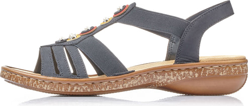 A gray sandal with decorative beads and multiple straps.