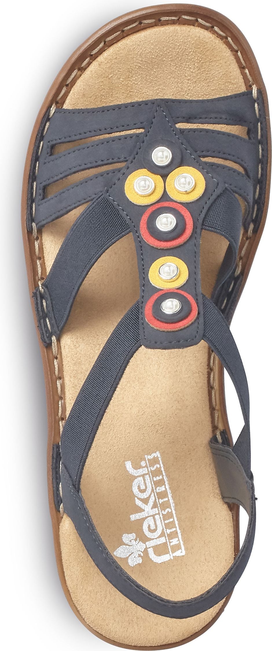 Navy sandal with circular embellishments.