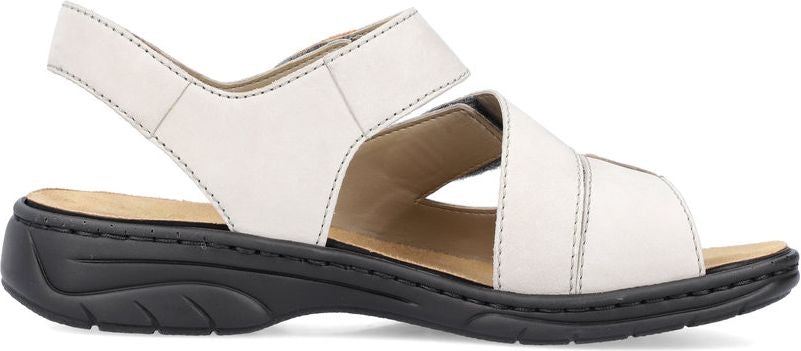 white sandal with velcro straps and a black sole
