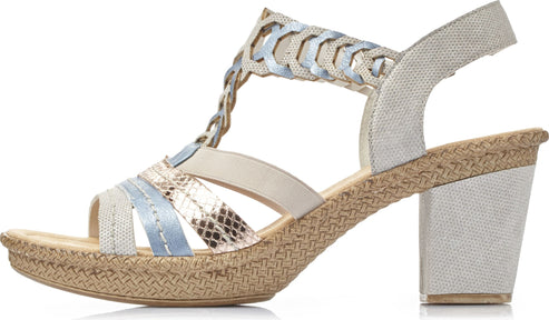 Light beige high heeled sandal with woven jute platform and metallic detailing.