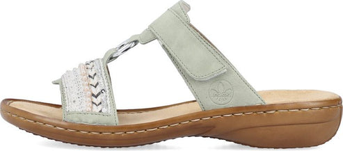 A women's pale green sandal with a T-strap and a velcro adjustable strap.