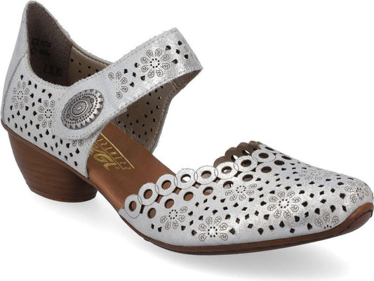 A silver shoe with patterned floral cutouts and a low heel.