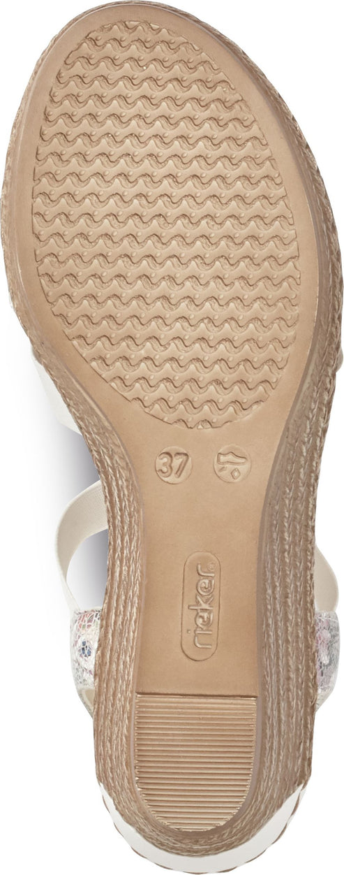 Bottom view of a sandal with a beige rippled sole, markings of "37", "Rieker" logo, and a heel.