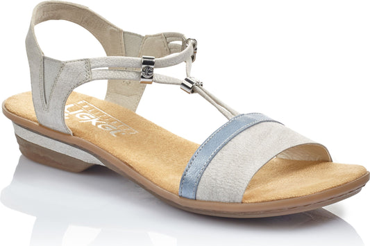 Beige sandal with a T-strap and buckle.