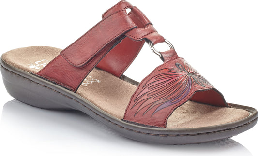 Red leather sandal with adjustable strap, silver ring detail, and floral design.