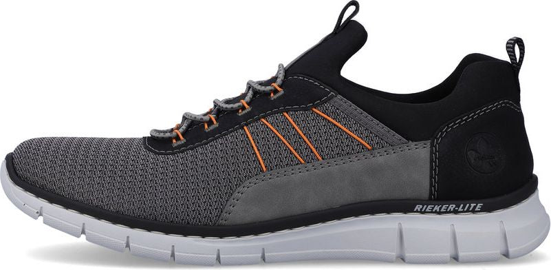 A side view of a sneaker featuring a grey and black color scheme with orange details and a white sole.