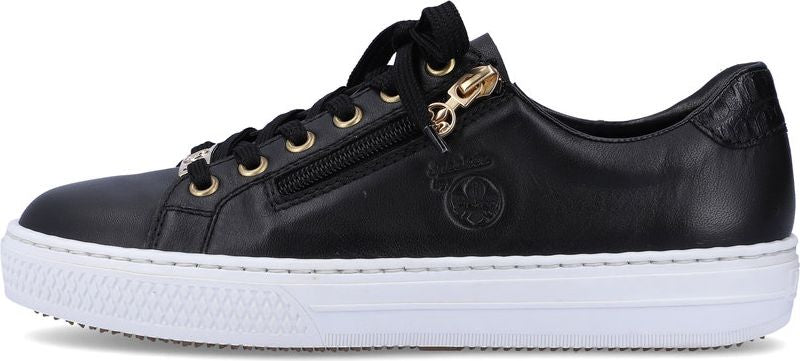 A black leather sneaker with white sole, laced up with black laces, and a zipper decoration.