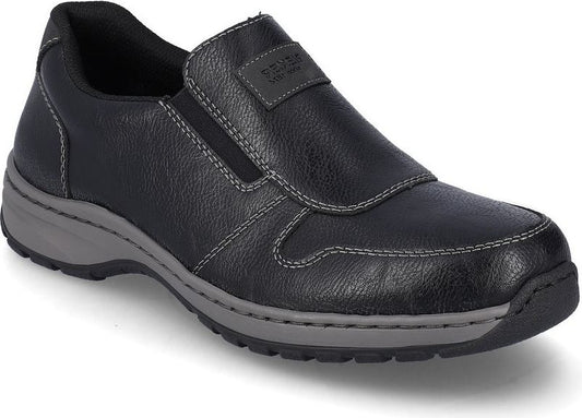 Black slip-on shoe with gray sole and gray label.