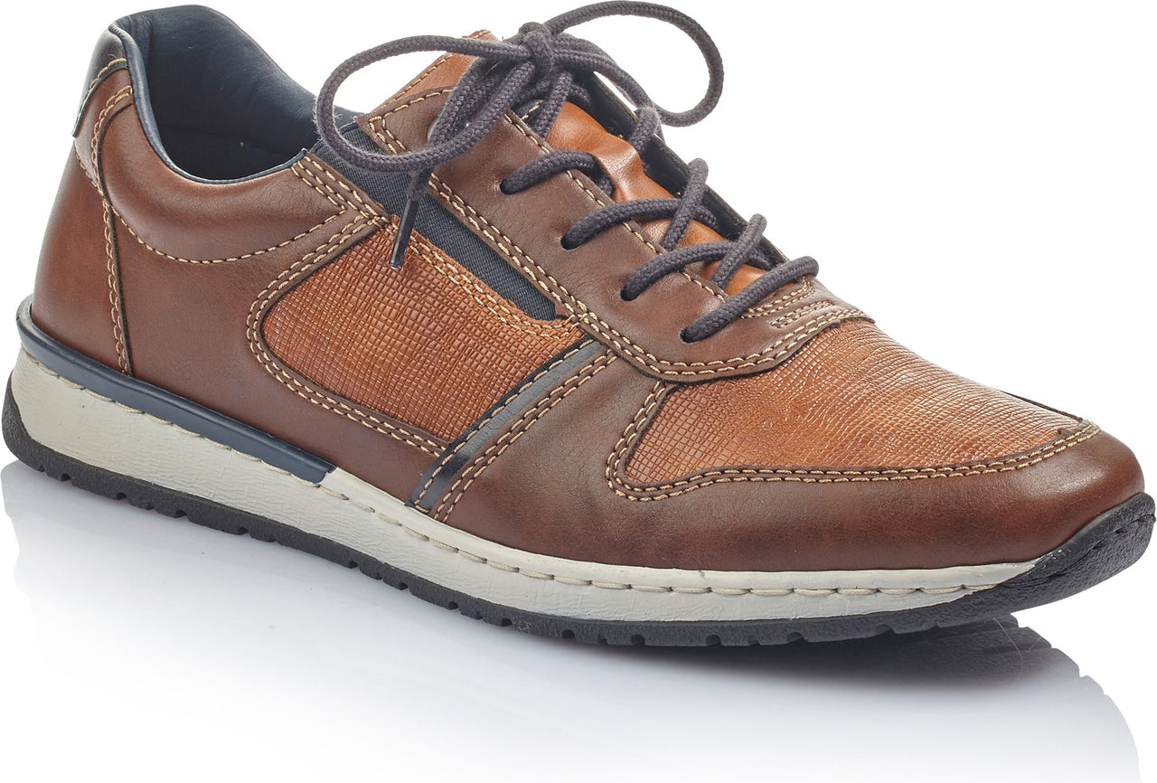 Brown leather lace-up shoe with textile panels and light sole.