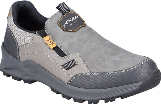 Gray and black slip-on shoe with textured sole and visible 'RIEKER since 1874' tag.