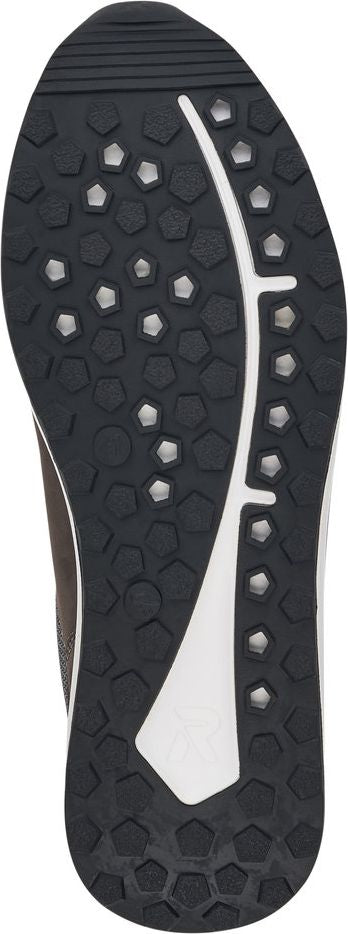 Shoe sole featuring a dark gray geometric pattern with white hexagon cutouts and a longitudinal white stripe.