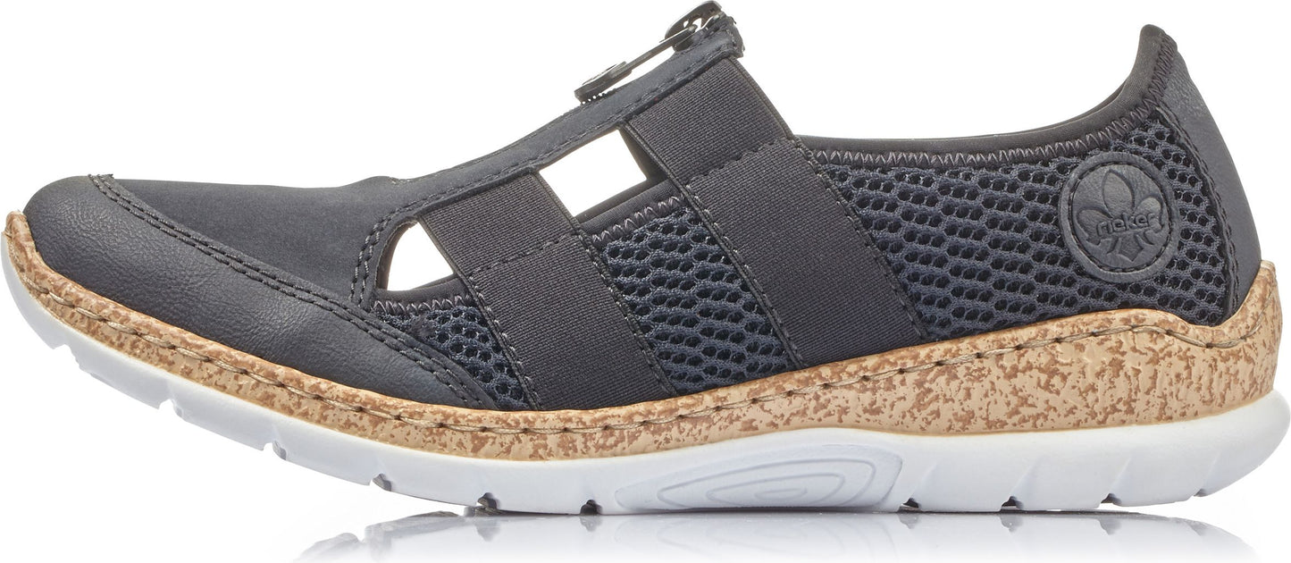 A gray shoe with brown cork midsole.