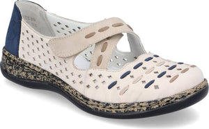Beige Mary Jane style shoe with a perforated upper, an adjustable strap, a dark blue heel counter, and a patterned sole.