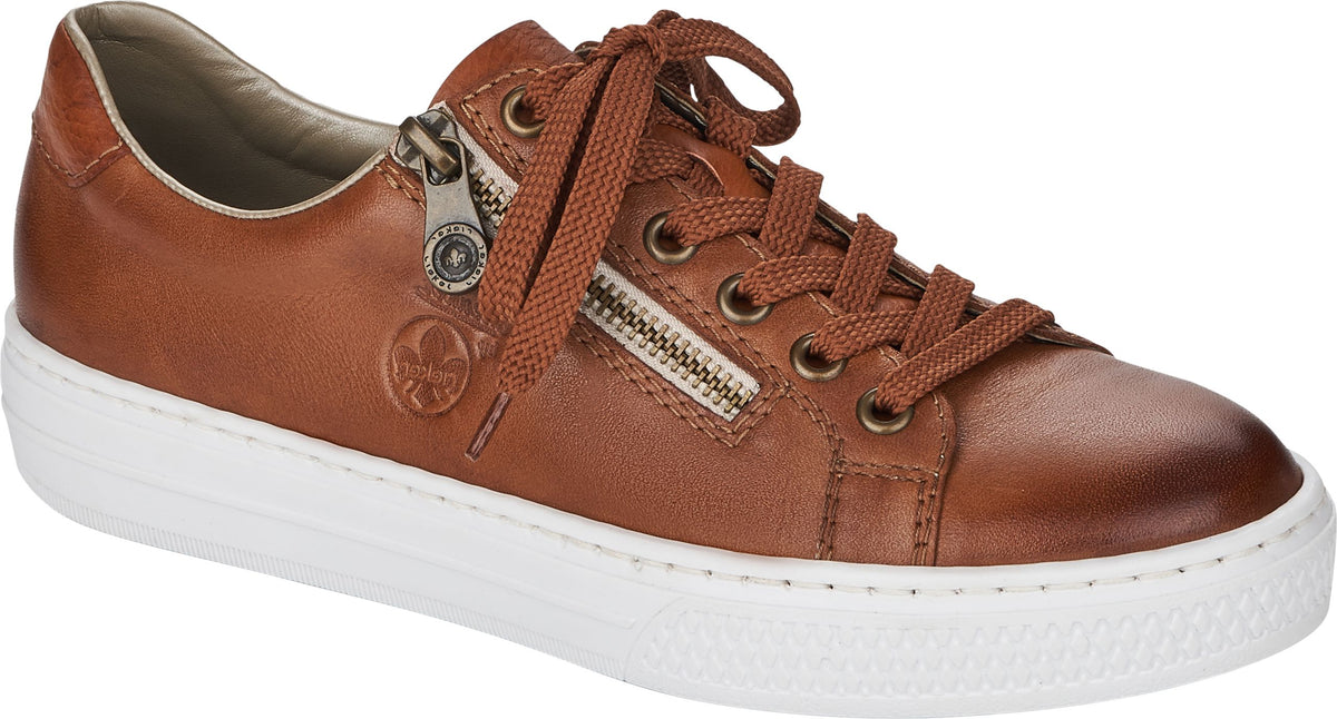 Brown sneaker with white sole, laces, and side zipper.