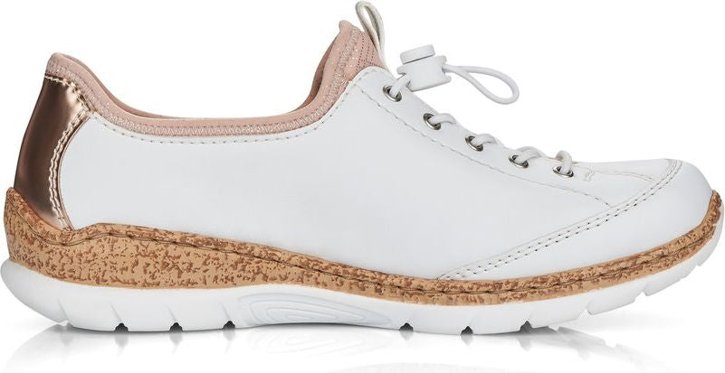 A white athletic shoe with elastic laces, light tan collar and cork textured midsole.