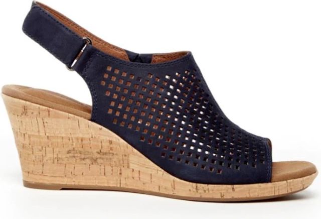 Navy blue peep toe wedge heel shoe with sling back strap and perforated vamp.