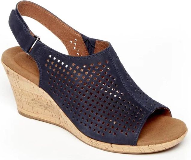 Navy blue perforated leather wedge sandal with slingback strap and cork heel.