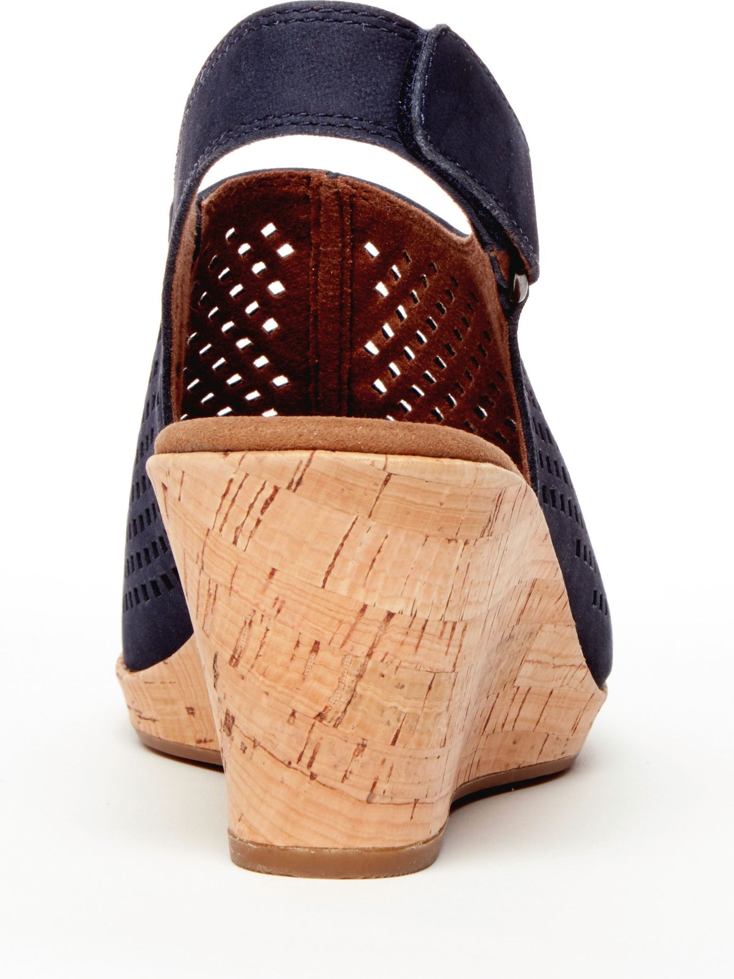 Back view of navy sandal with cork wedge heel and velcro strap.