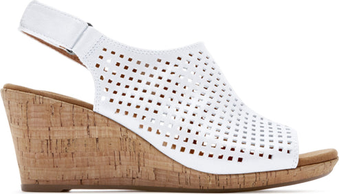 White wedge heel sandal with slingback strap and perforated upper.