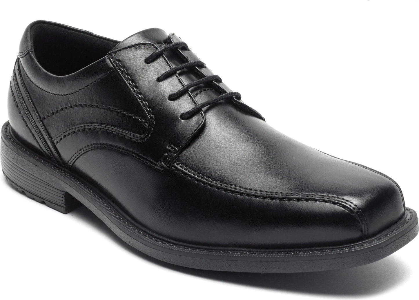 Black leather dress shoe with rounded square toe and lace-up closure.