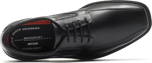 A black leather dress shoe with laces.