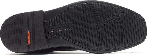 black shoe sole with orange accent