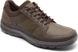 Brown leather walking shoe with brown laces and a dark sole.