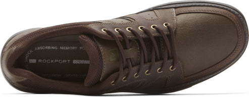 A brown shoe with visible laces.