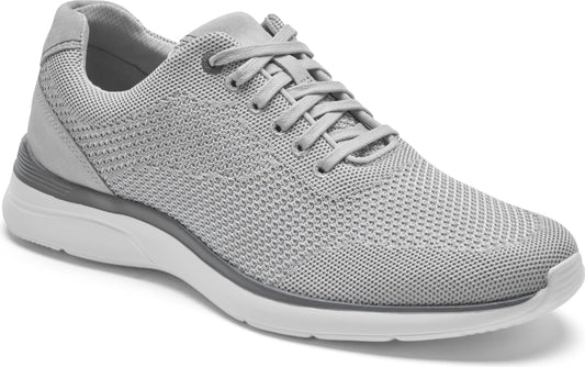 Gray knit walking shoe with laces and white sole.