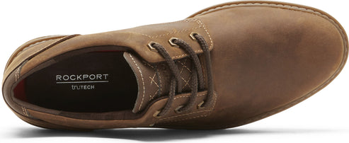 A brown leather lace-up shoe, showing the inside and top.