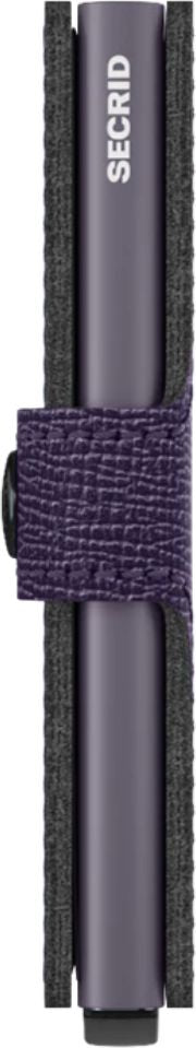 A dark gray Secrid wallet, held together with a wide purple elastic band and black button.