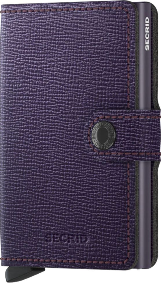 Purple wallet with a metal cardholder and the word 'SECIRD' printed on the right side.