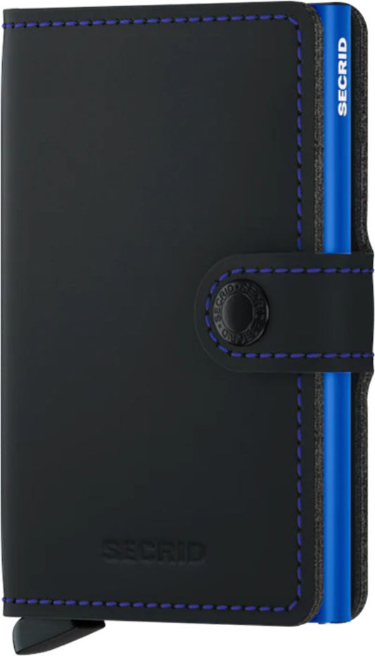 Black leather wallet with purple stitching, button closure, and card slider with blue stripe; text 'SECID' is visible on both the wallet's exterior and the card slider.
