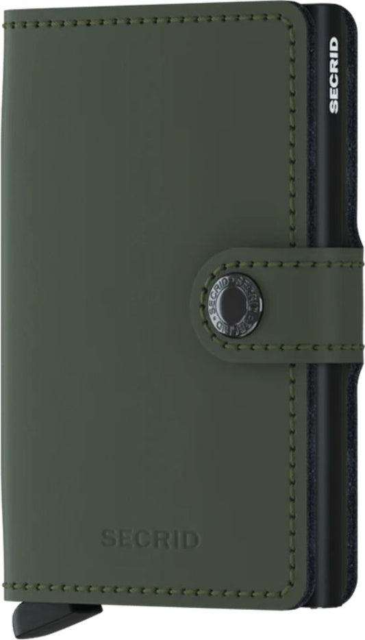 Closed matte olive green wallet with a metallic button clasp, and the word "SECIRD" is visible on the side.