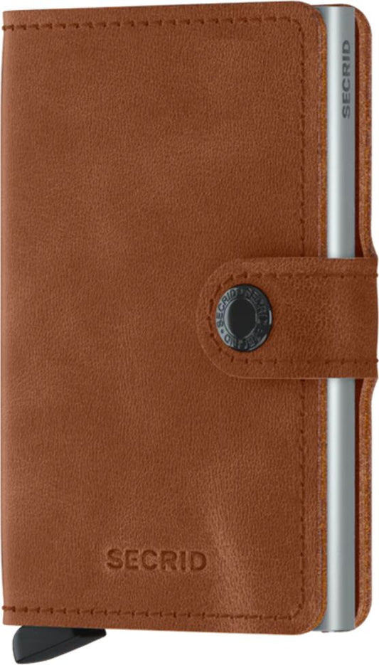 Brown leather wallet with button clasp and metal cardholder.