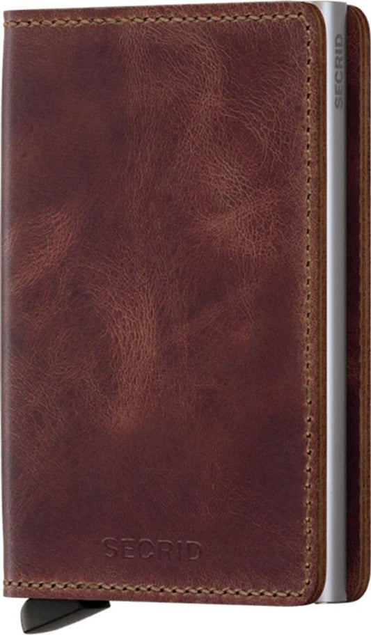 Brown leather wallet with silver cardholder.