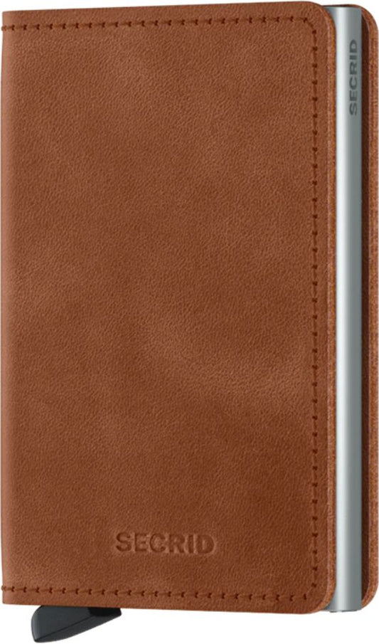 Leather cardholder with a metal card protector.