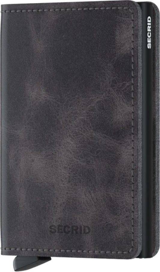 Gray leather wallet with visible logo.