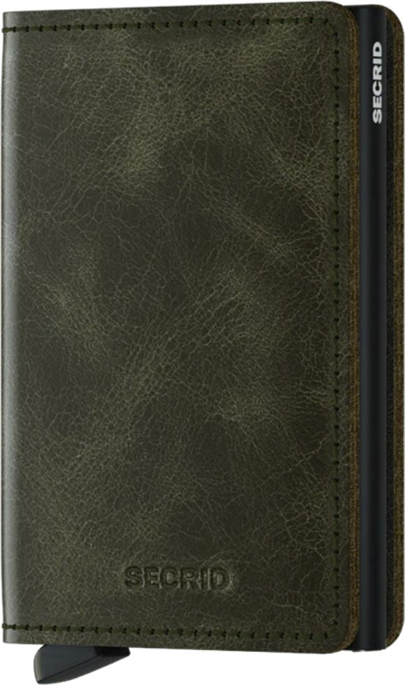 Closed olive green leather card holder with visible logo and ejector.