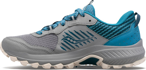 A gray and blue trail running shoe with a rugged outsole.