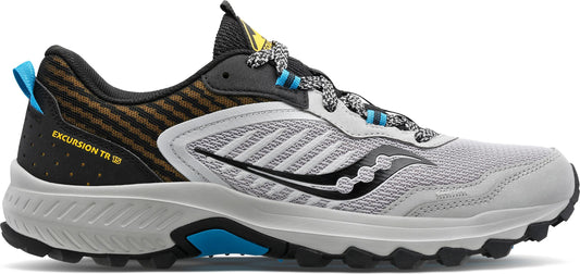 A running shoe with a light gray mesh upper, black logo, black heel with yellow stripes, and a gray and black sole.