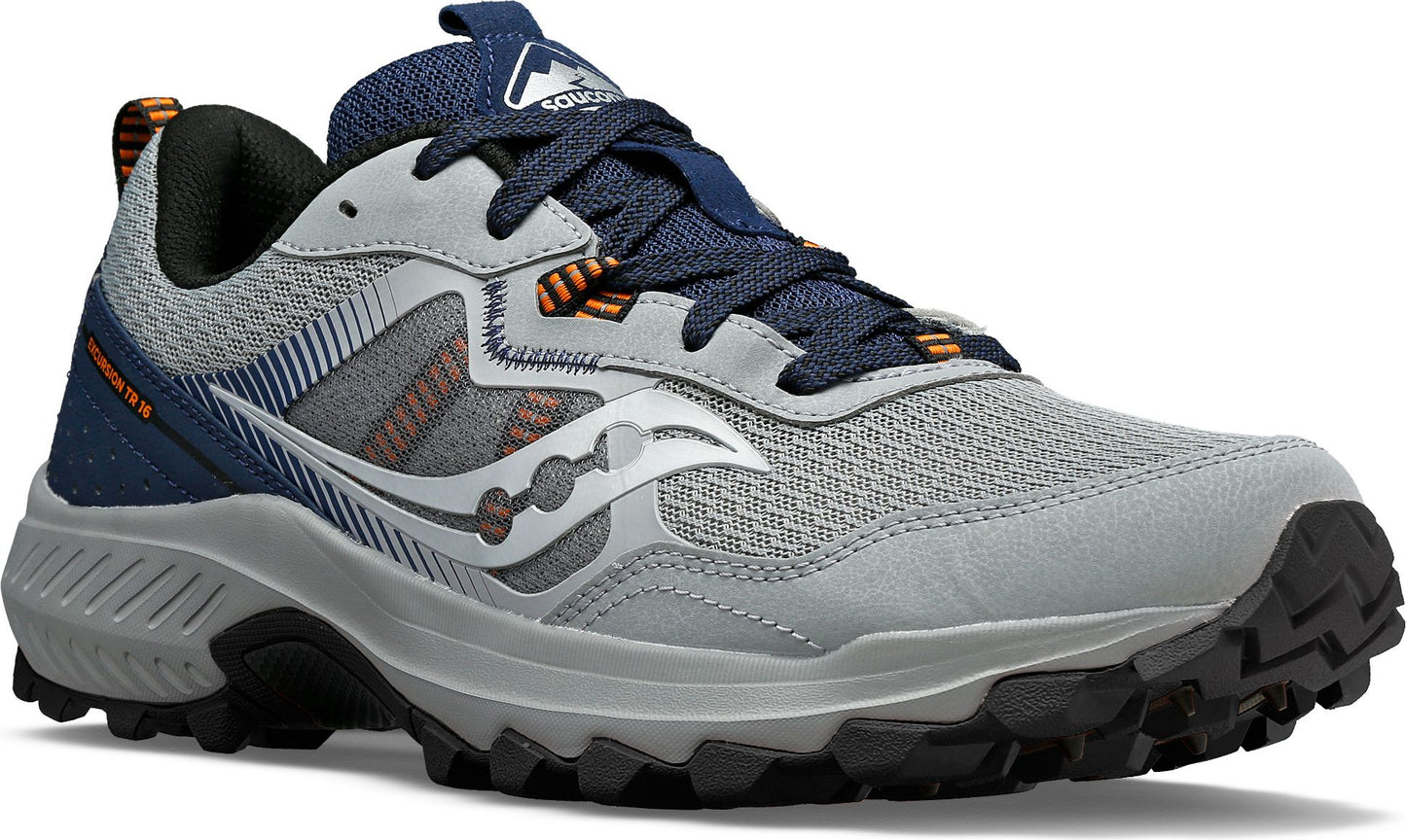 Trail running shoe in gray and navy, with orange accents, and a lugged black sole.