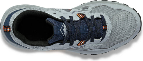 A gray athletic shoe with dark navy laces and an orange accent.