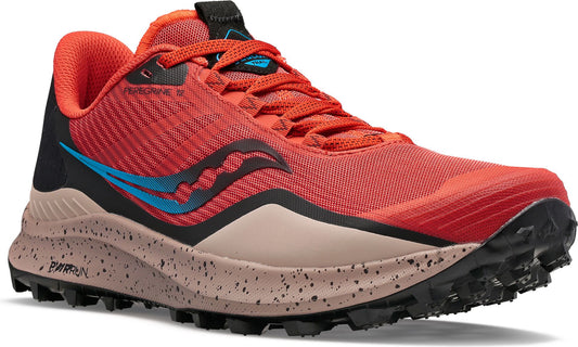A low-cut trail running shoe in coral and tan with a blue logo and a black sole.