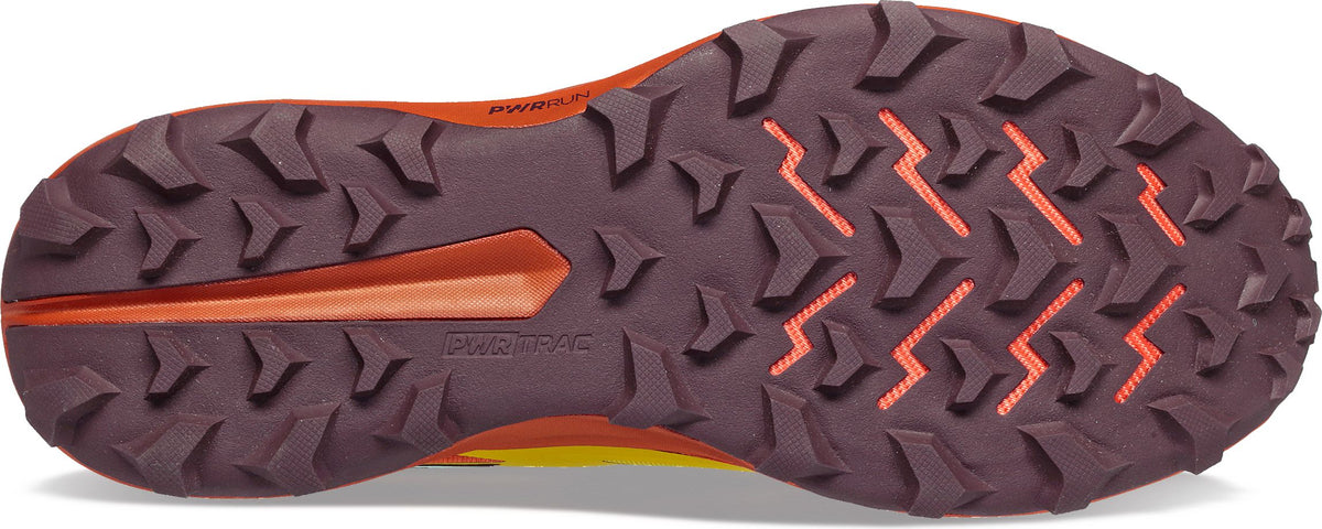 The underside of a shoe with brown and orange sole.