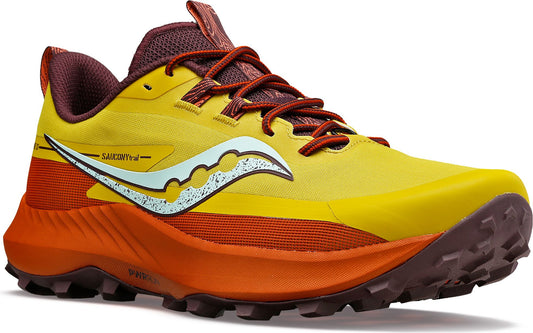 Trail running shoe with a yellow upper, orange midsole, brown sole, brown laces and a white logo.