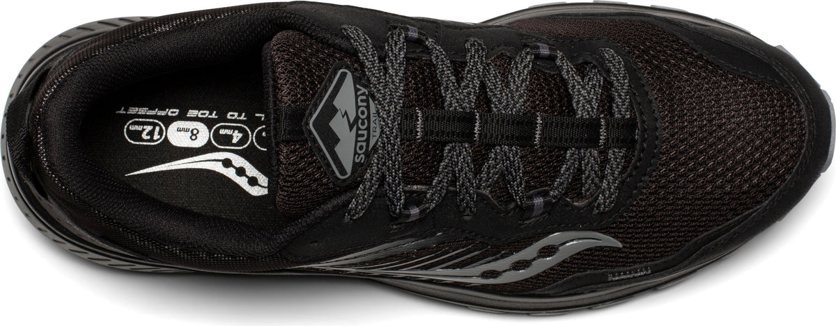 Black athletic shoe with gray laces and logos on tongue and side.