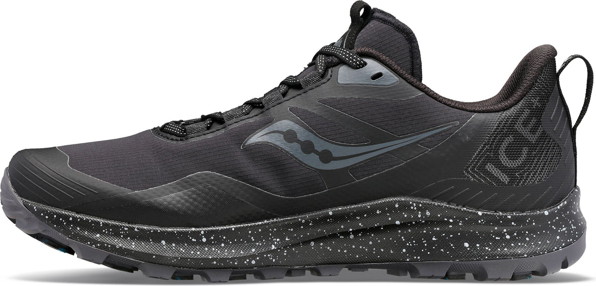 A black trail shoe with ICE+ written on the heel.