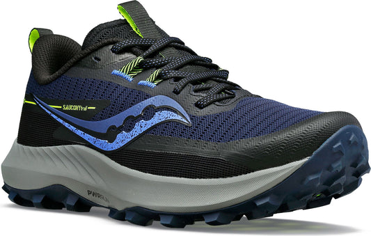 A low-cut athletic shoe is navy with blue accents and a jagged rubber sole.